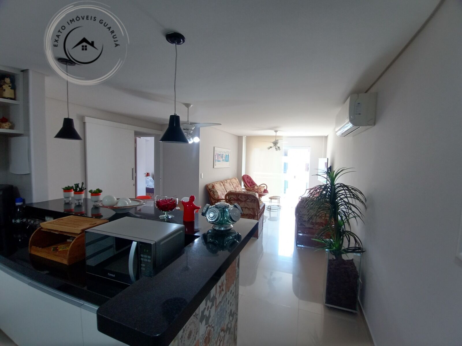 Apartamento Padrão de 03 dormitórios para venda na praia da Enseada. - foto 4