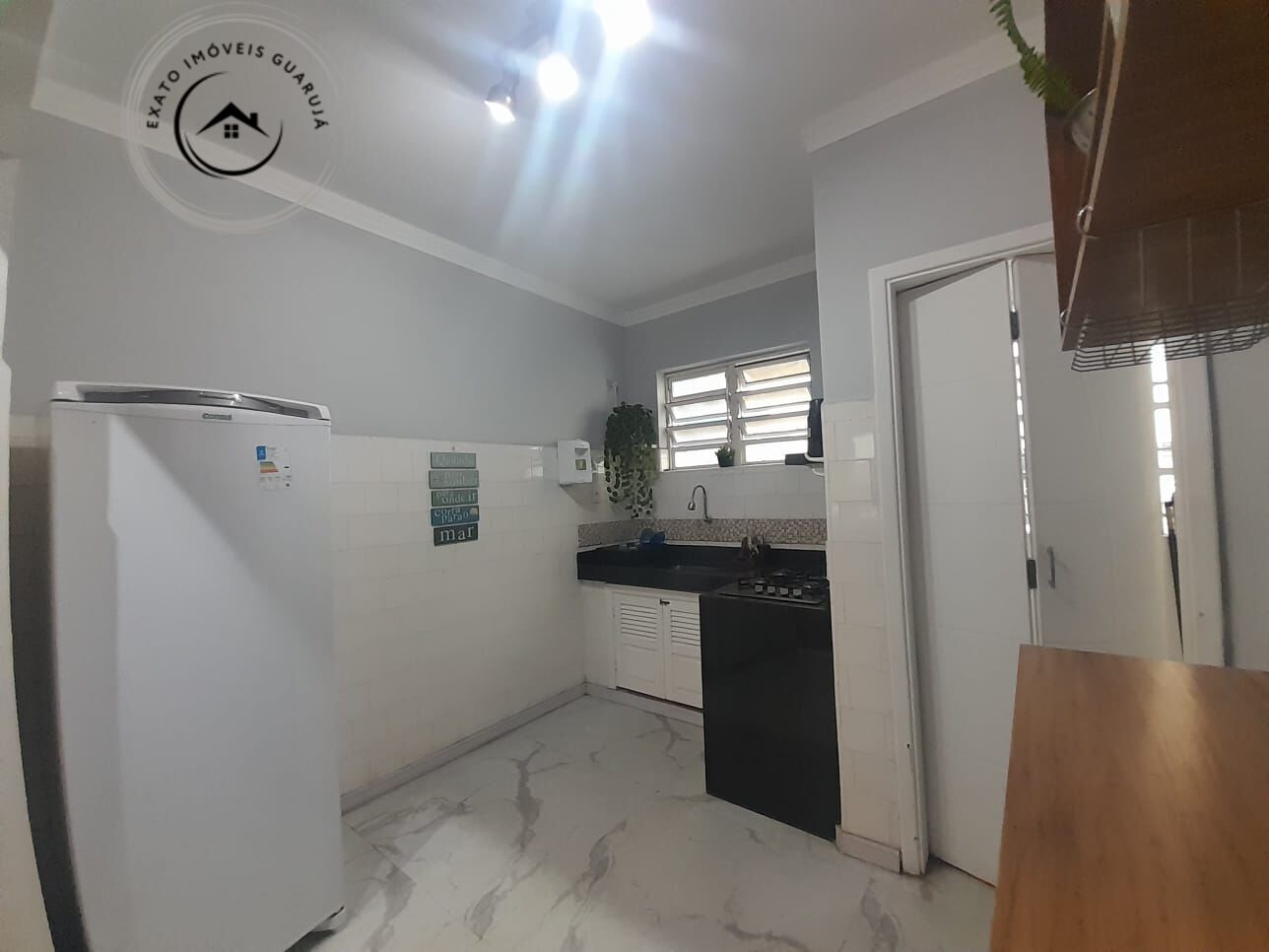 Apartamento Padrão de 02 dormitórios para venda na Praia da Enseada. - foto 4