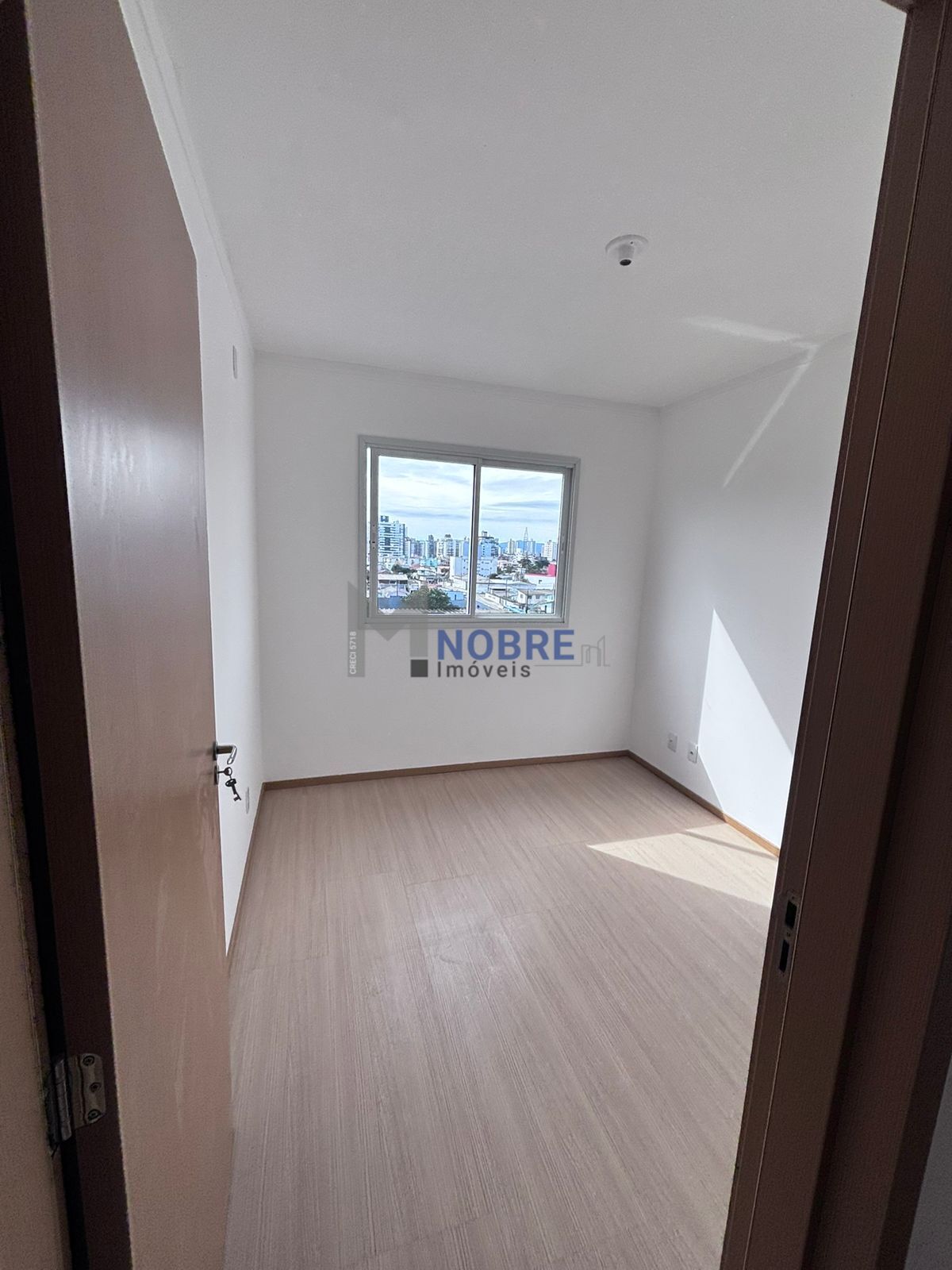 Apartamento à venda com 2 quartos, 1 banheiro, 1 vaga e 58m² no Barreiros, São José (SC) — foto 9 de 11